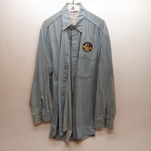 Johnny Rutherford's Indianapolis Motor Speedway Radio Network blue denim shirt. Size medium. From the Private Collection of Johnny Rutherford.