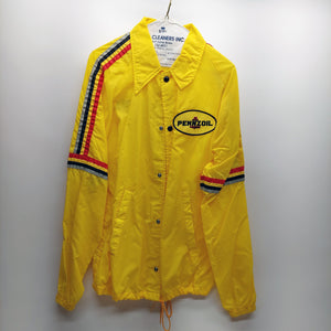 Johnny Rutherford's Pennzoil Chaparral yellow windbreaker jacket. Size medium. From the Private Collection of Johnny Rutherford.