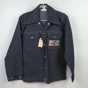 Betty Rutherford's Champion Spark Plugs Denim Jacket Small. From the Private Collection of Johnny Rutherford.