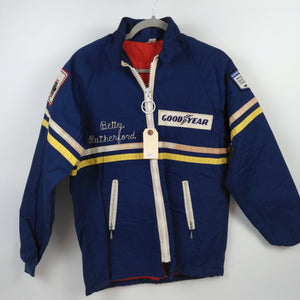 Betty Rutherford's 1976 McLaren Hy Gain Goodyear Jacket Small. From the Private Collection of Johnny Rutherford.