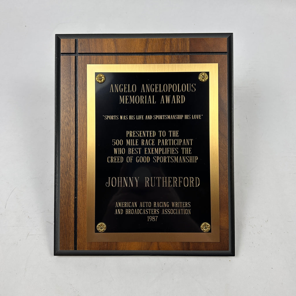 Johnny Rutherford's Angelo Angelopolous Memorial Award Plaque for the Creed of Good Sportsmanship. Presented by the American Auto Racing Writers and Broadcasters Association in 1987.