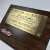 Johnny Rutherford's Award of Excellence Plaque. Presented by Mecom and Kalb in 1981.