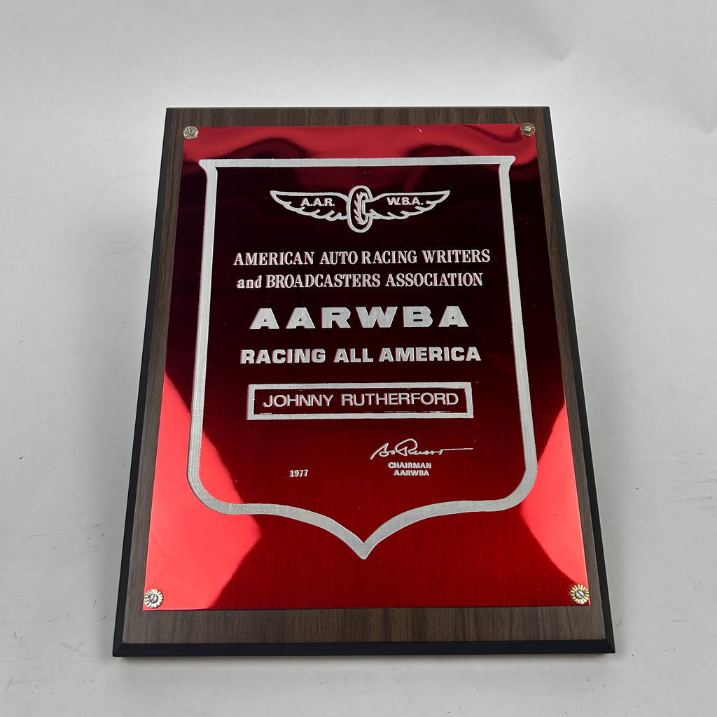 Johnny Rutherford's 1977 American Auto Racing Writers and Broadcasters Association Award.